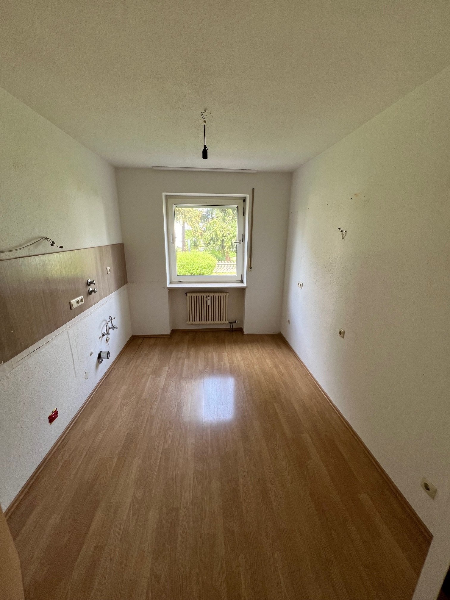 Gut geschnittene 4 Zimmer Erdgeschosswohnung mit Balkon